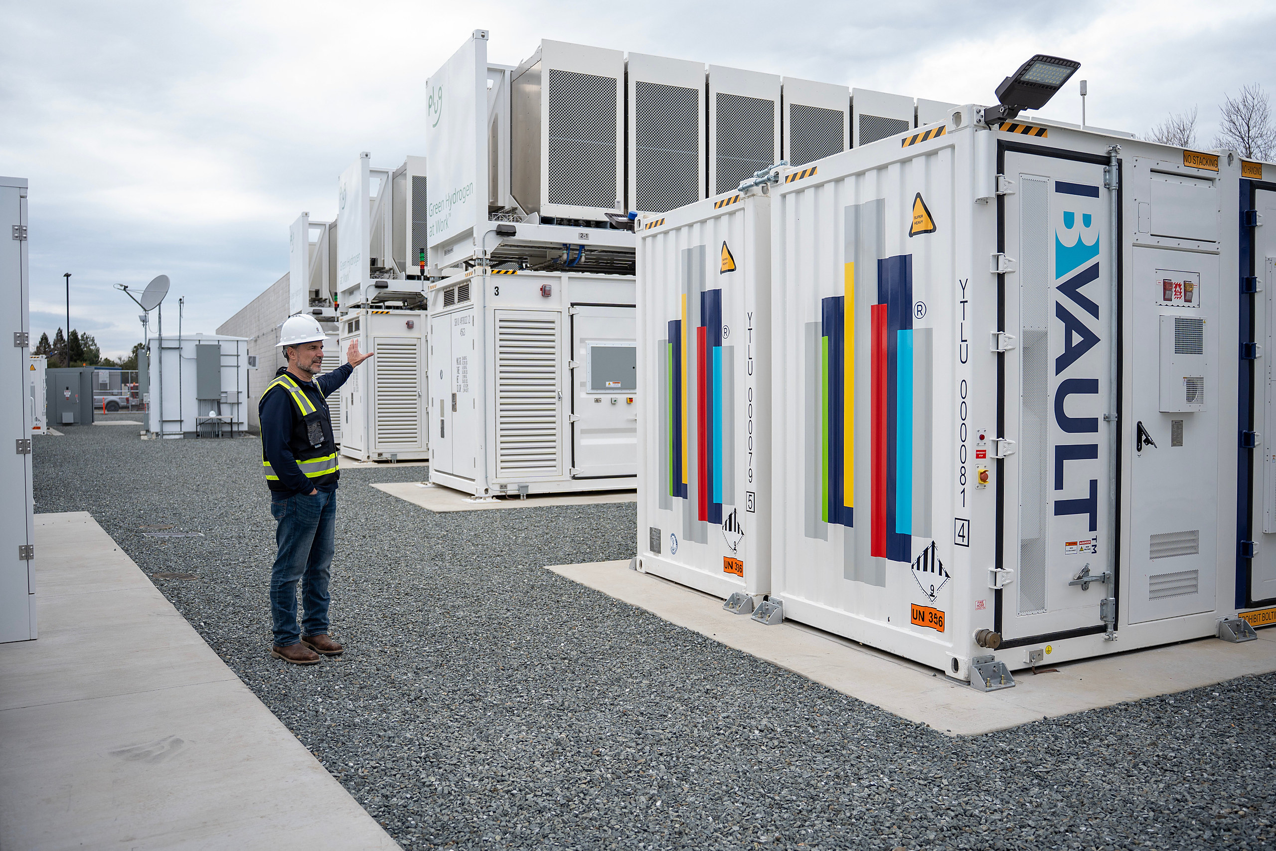Technician working inside a data center