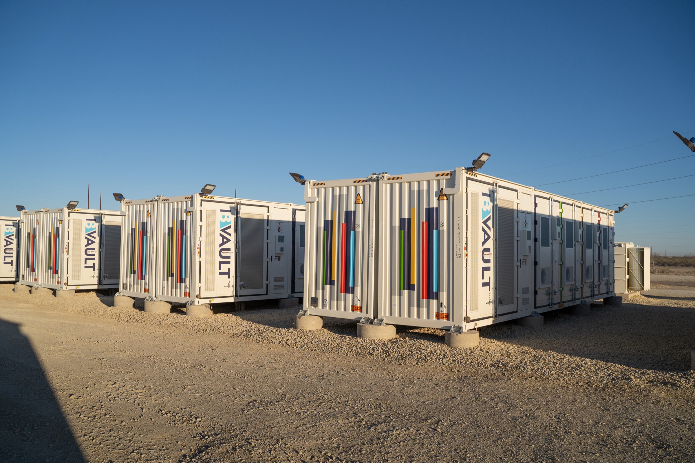 B-VAULT storage containers under a dramatic sky