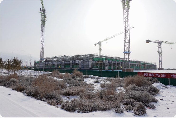Tower cranes rising over the gravity storage site